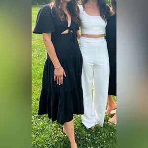 Black flutter sleeve dress.